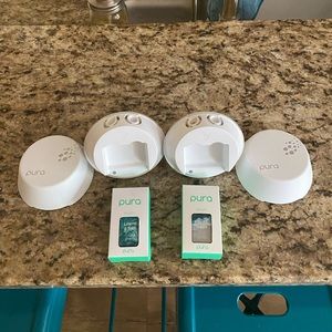 2 Pura Diffusers with 2 scent inserts